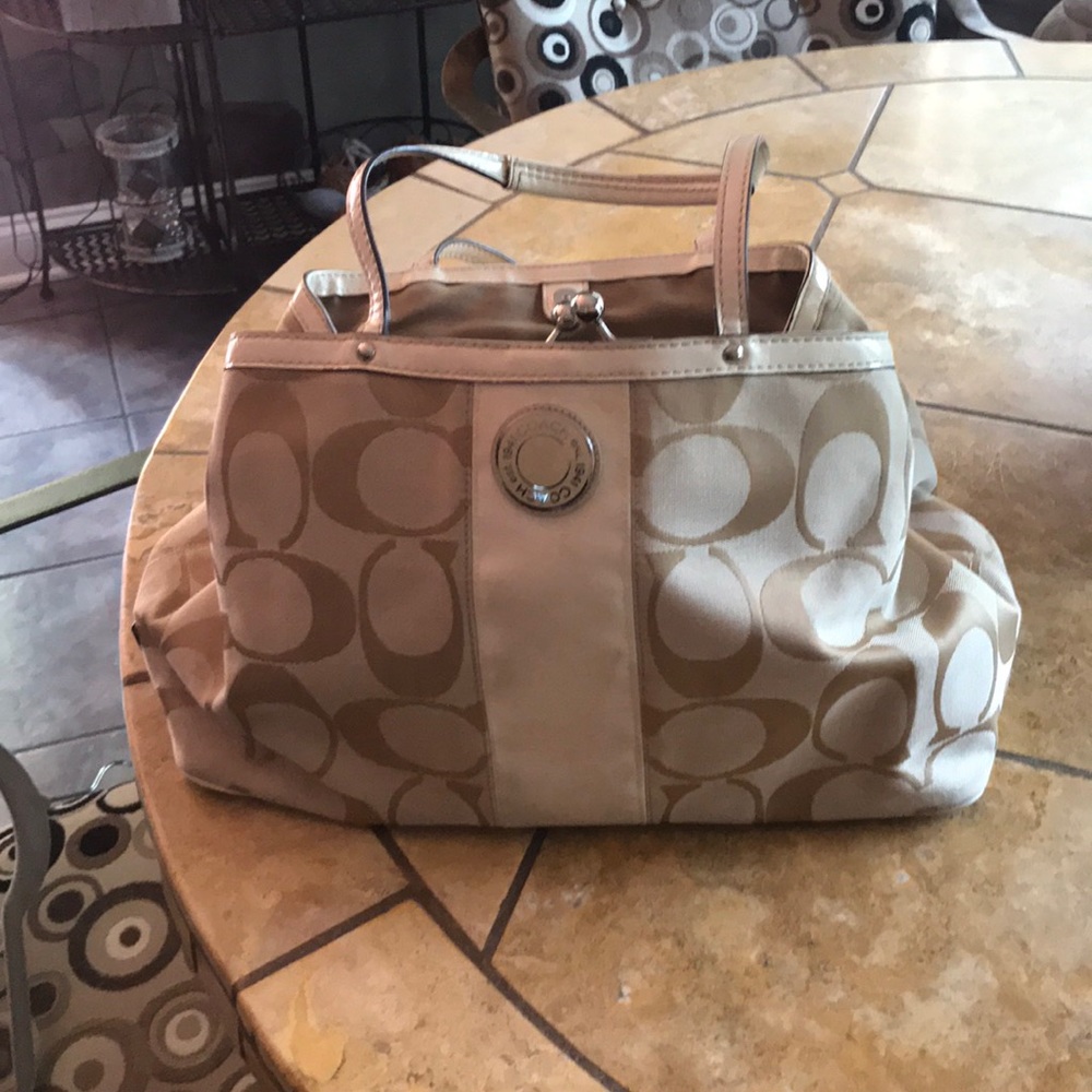 Super cute tan and cream coach bag